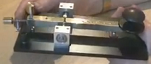 Small still from Norman G4LQF's video about his new homebrew Morse key.