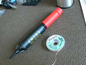 Photograph of desoldering pump and wick