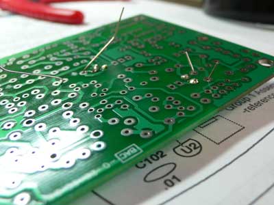 Photograph of bottom of PCB showing wires before soldering